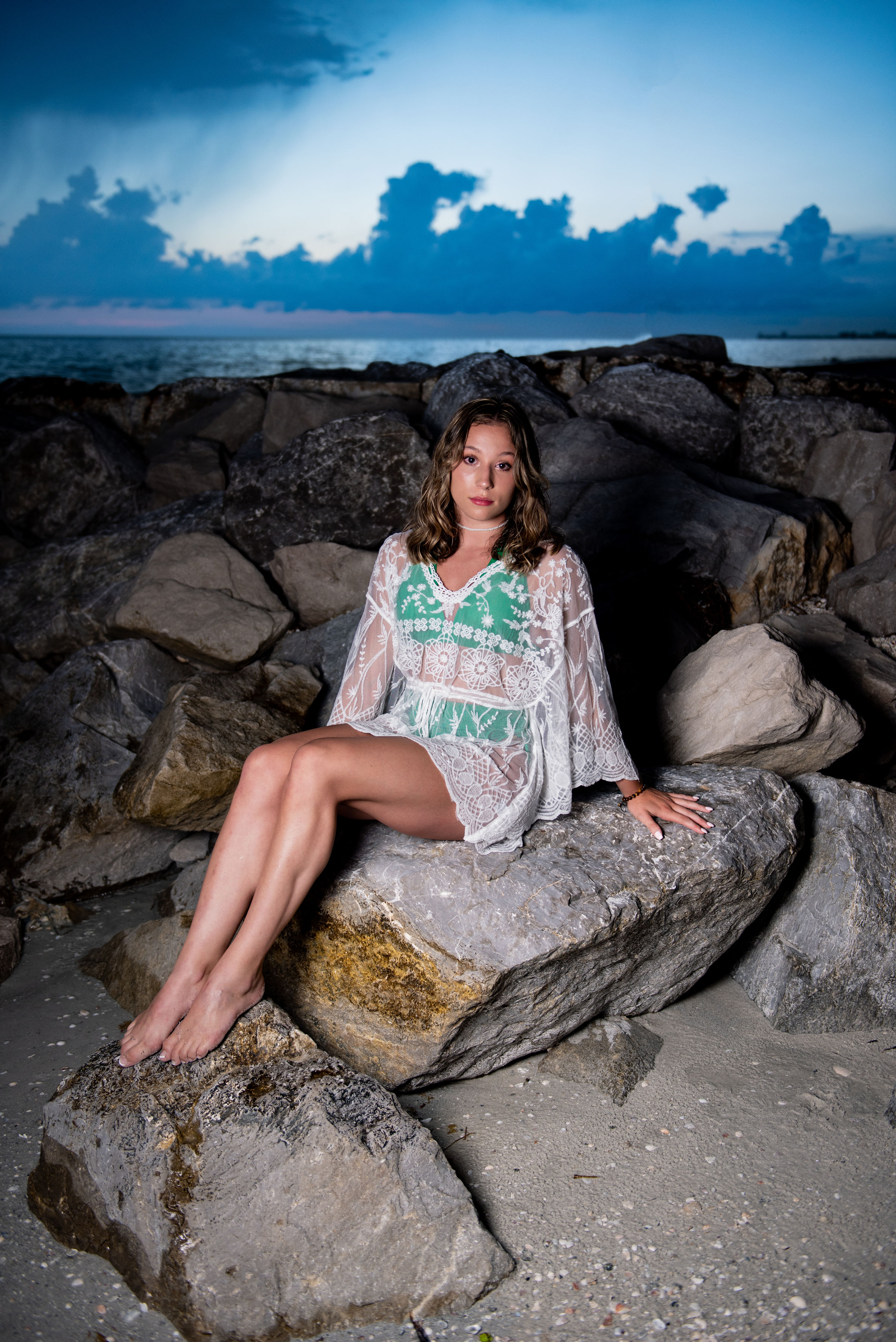 Senior portrait at Honeymoon Island State Park at sunset